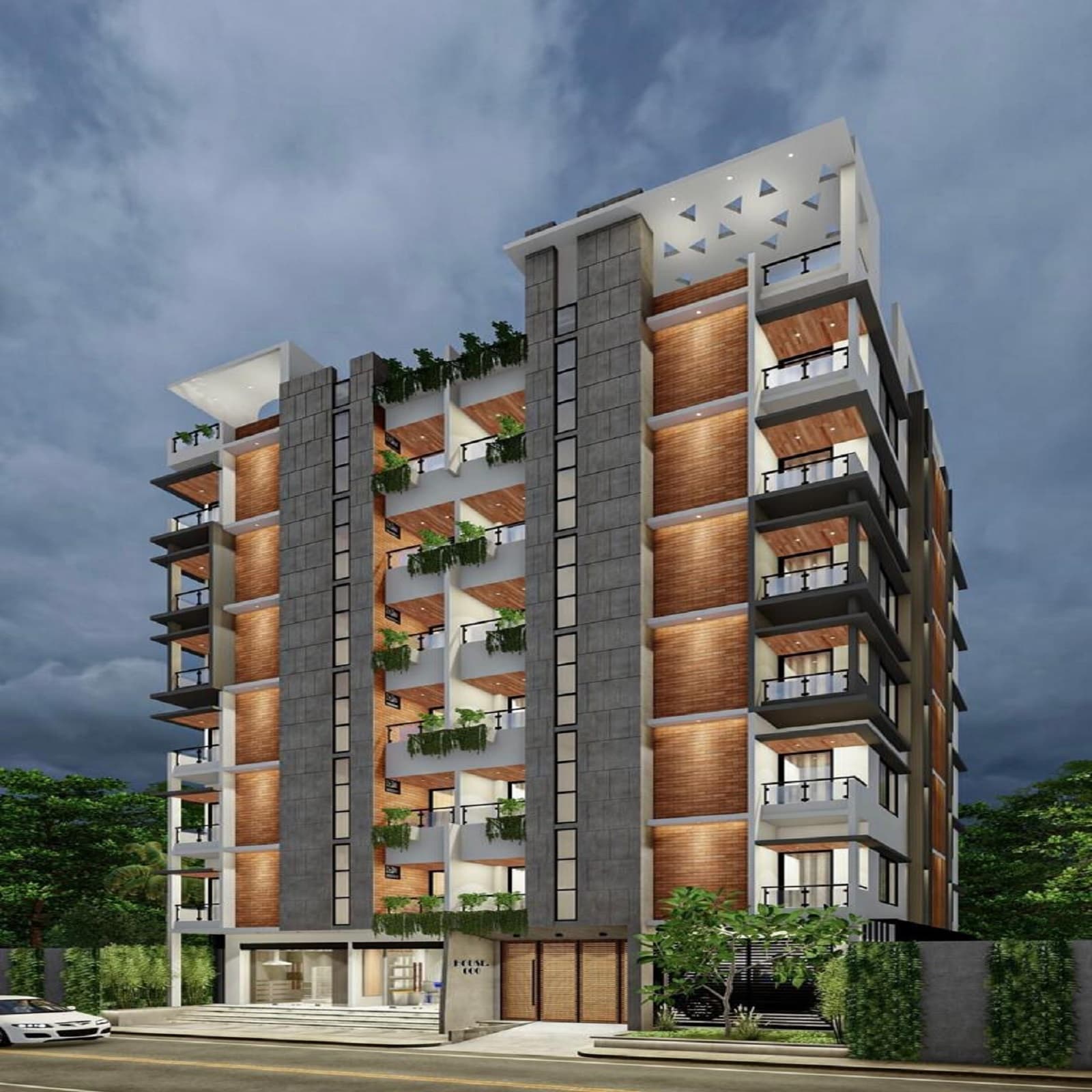 Completed seven-storey apartment block at dusk, grey stone piers and timber-slat balcony infill, roof pergola with triangular skylights, storm clouds overhead